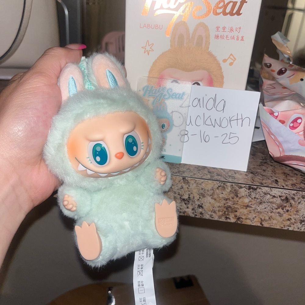 QUQU green labubu